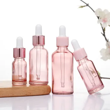 Lašintuvo buteliukai Pakartotinai užpildomas 5-100ML rožių dangtelio kosmetikos indas Rožinio stiklo aromaterapinis skystis eterinio masažo aliejaus pipetei
